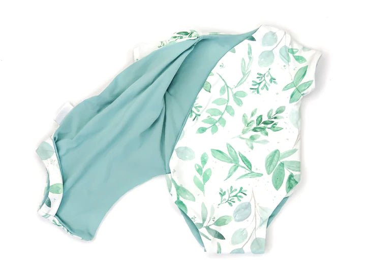 Reversible short-sleeve winged bodysuit in Saged Eucalyptus made with soft classic brushed fabric.