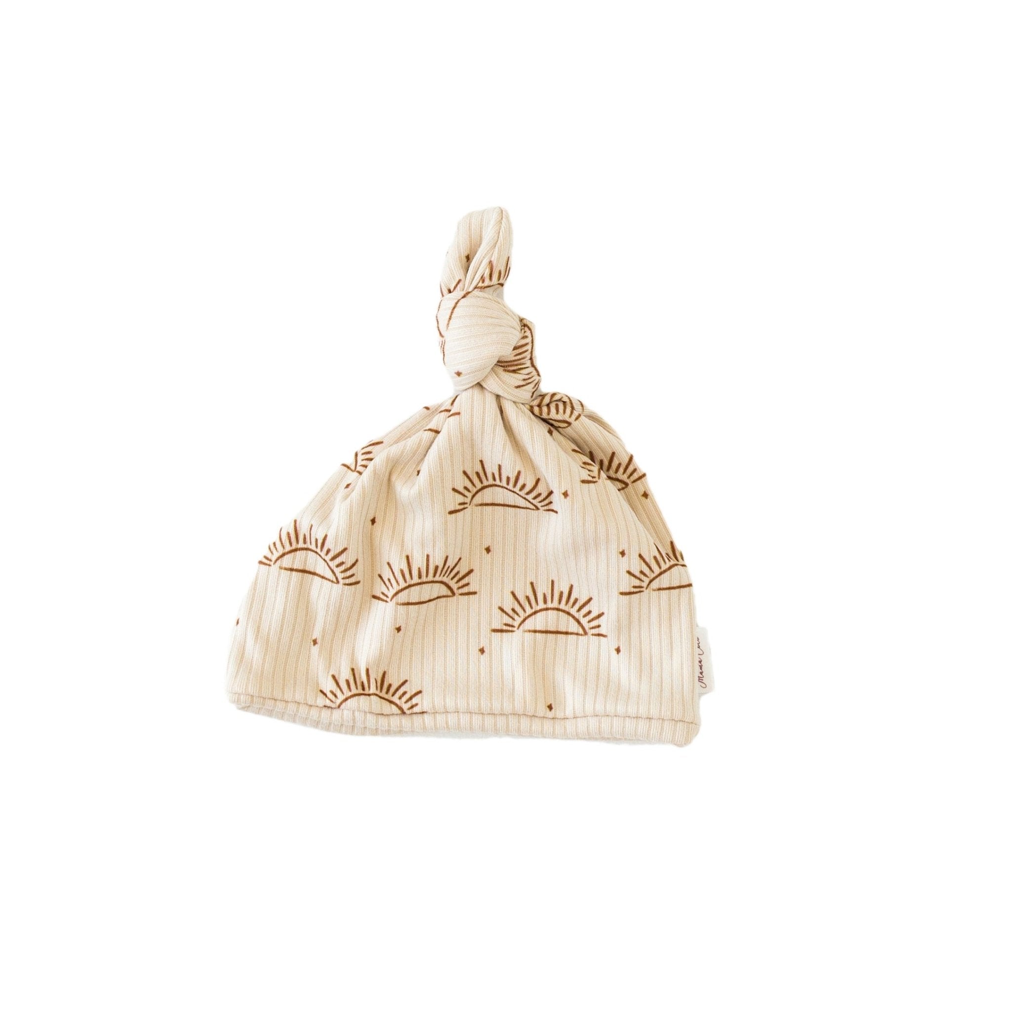 Reversible baby beanie featuring the Sandy Sunsets print with cozy classic brushed softness.