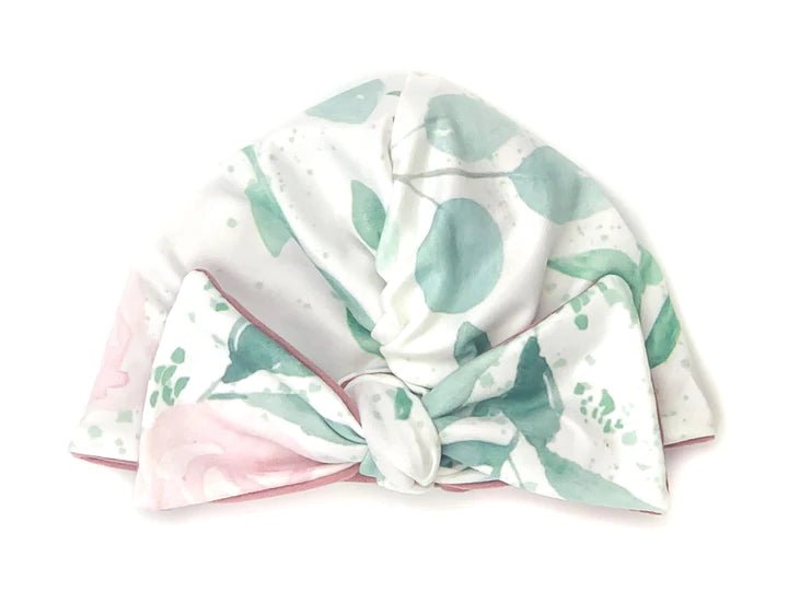 Comfortable Blushing Eucalyptus ruched baby beanie with bow crafted from classic brushed baby fabric.